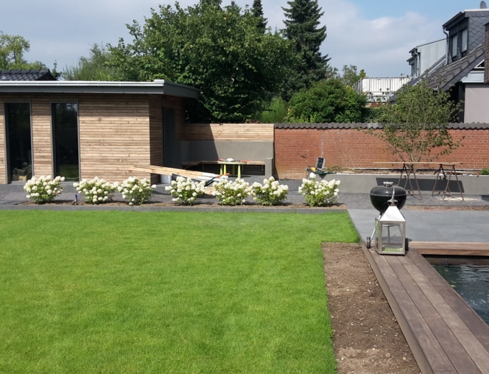 Terrasse als Halbkreis - Erdmann Gartengestaltung